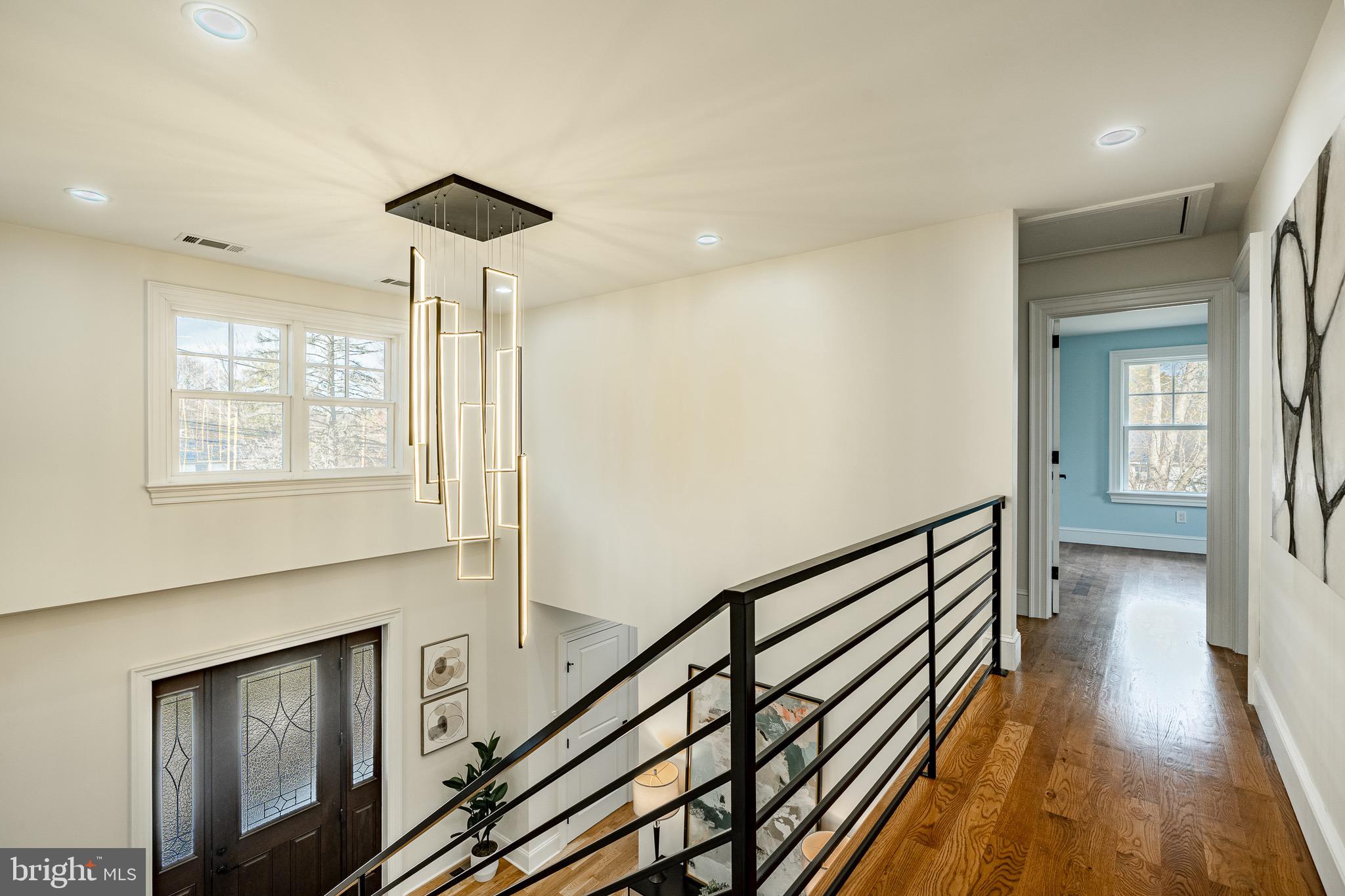 370 Boot Road West Chester, PA 19380 - Photo 19 of 56 a view of a hallway with wooden floor and staircase