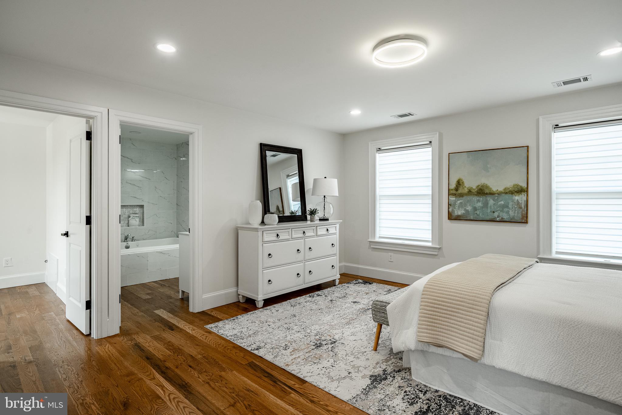 370 Boot Road West Chester, PA 19380 - Photo 22 of 56 a bedroom with a bed and a view of living room