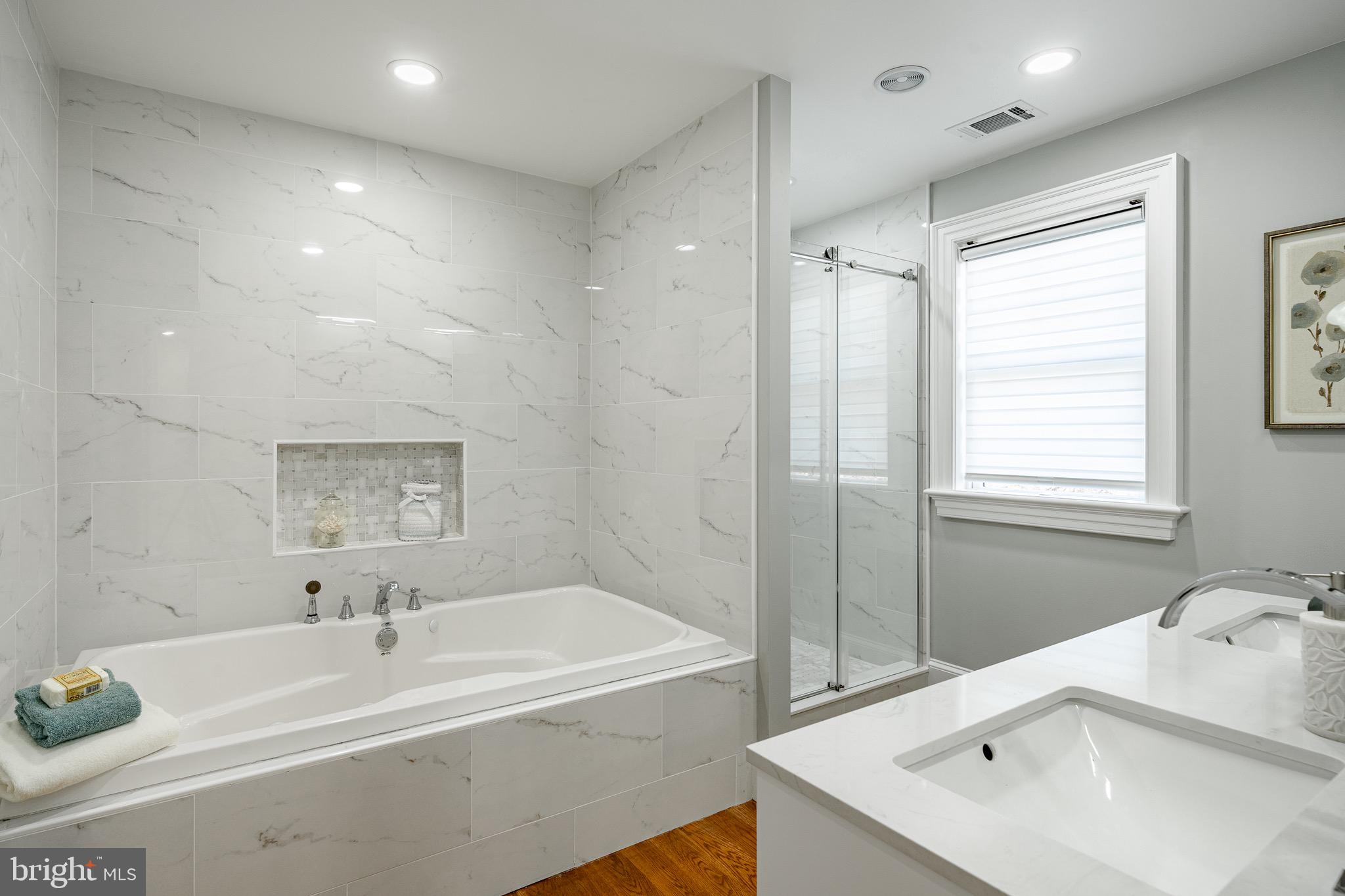 370 Boot Road West Chester, PA 19380 - Photo 23 of 56 a bathroom with a bathtub and a sink