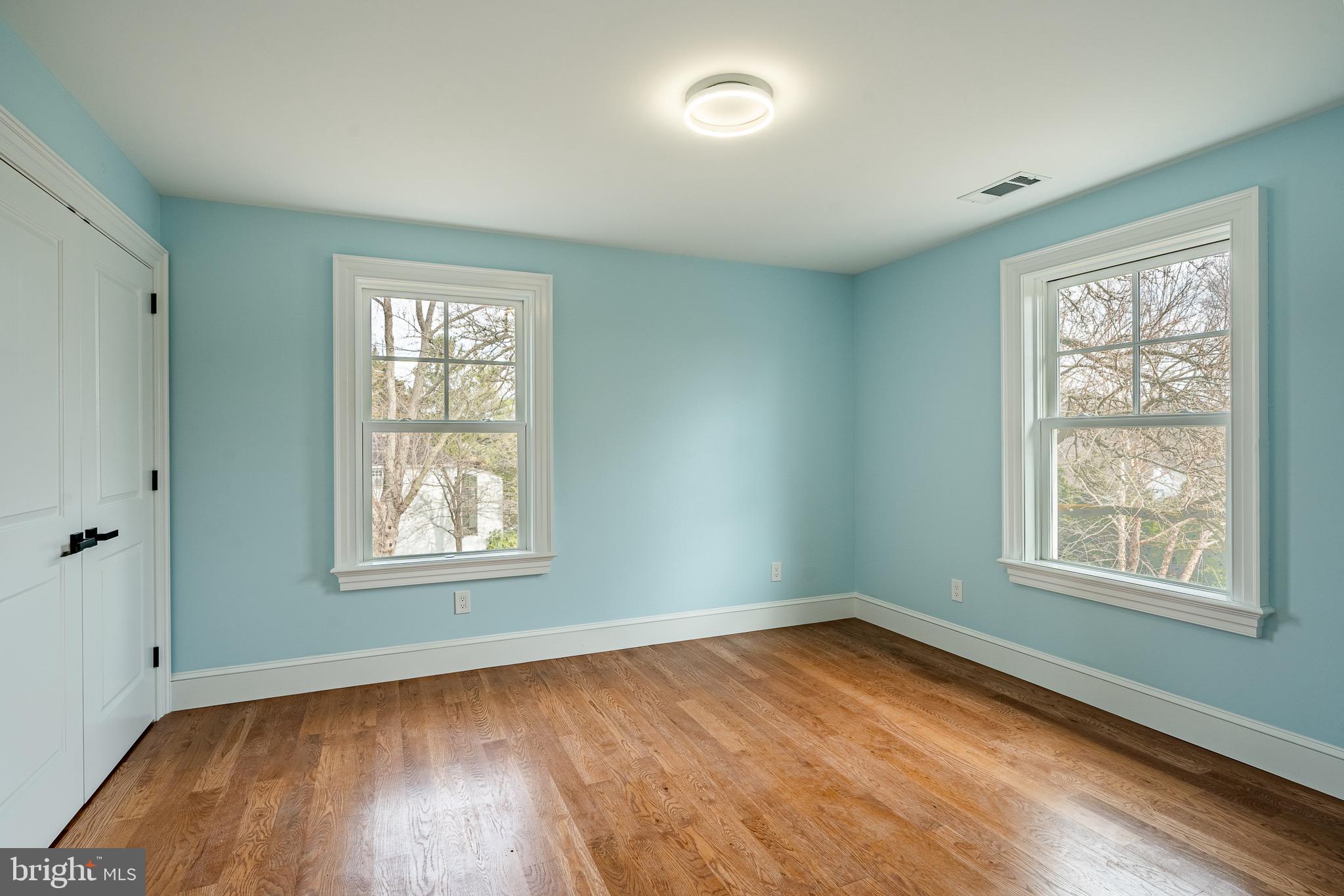 370 Boot Road West Chester, PA 19380 - Photo 29 of 56 an empty room with wooden floor and windows