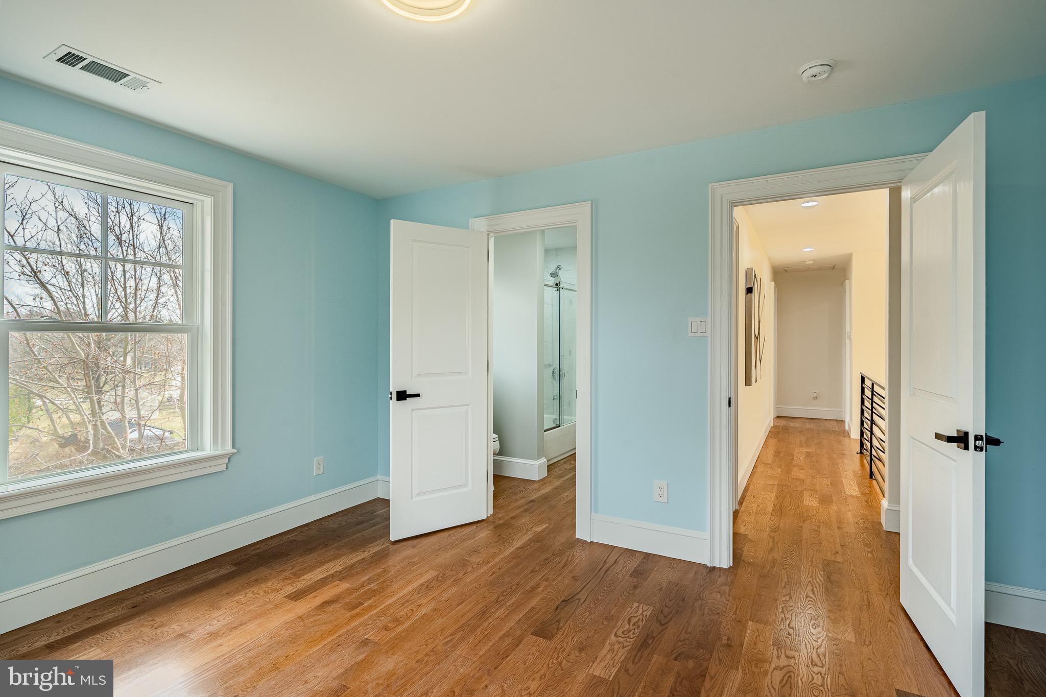 370 Boot Road West Chester, PA 19380 - Photo 30 of 56 wooden floor in an empty room with a window