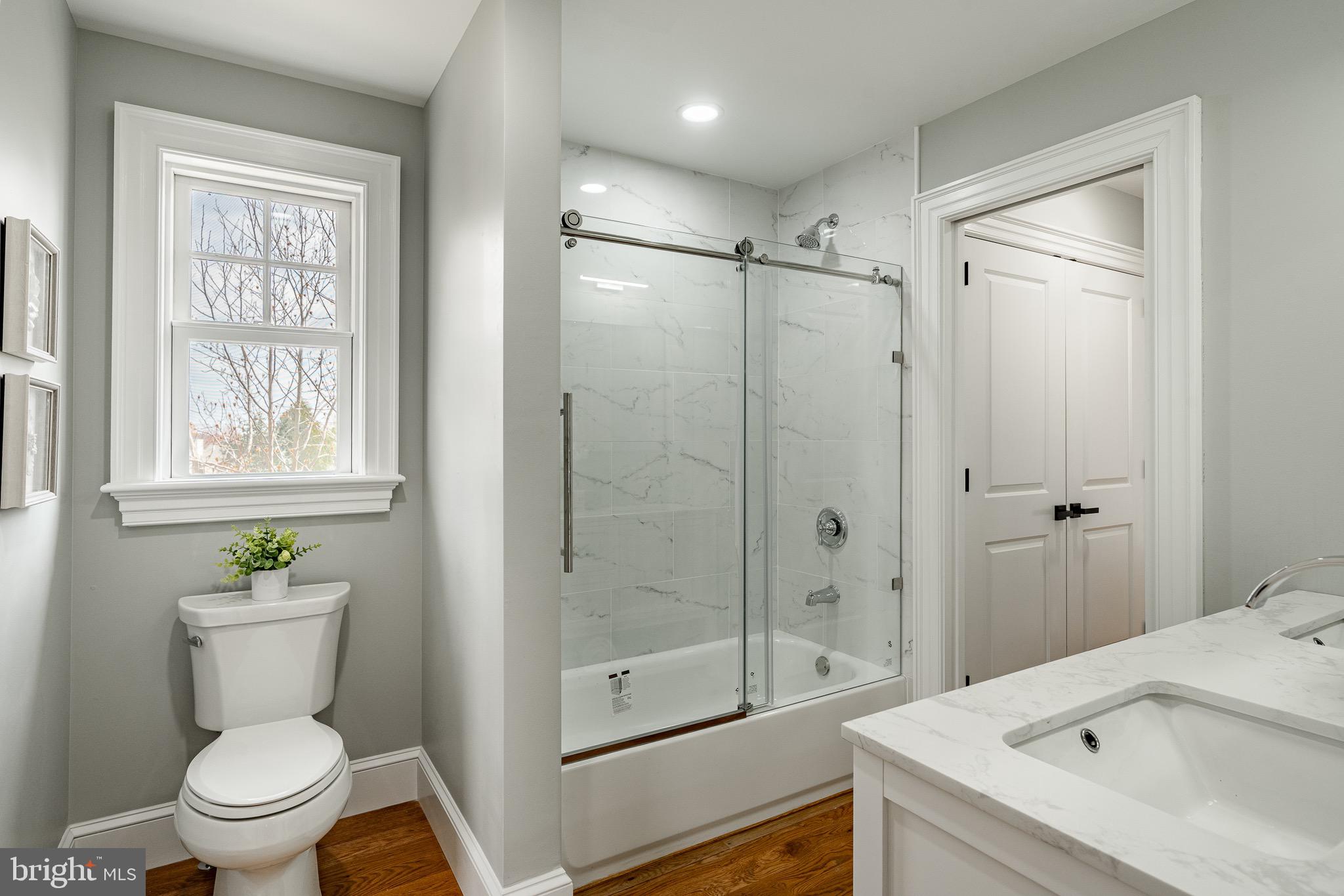 370 Boot Road West Chester, PA 19380 - Photo 31 of 56 a bathroom with a shower sink vanity mirror and toilet