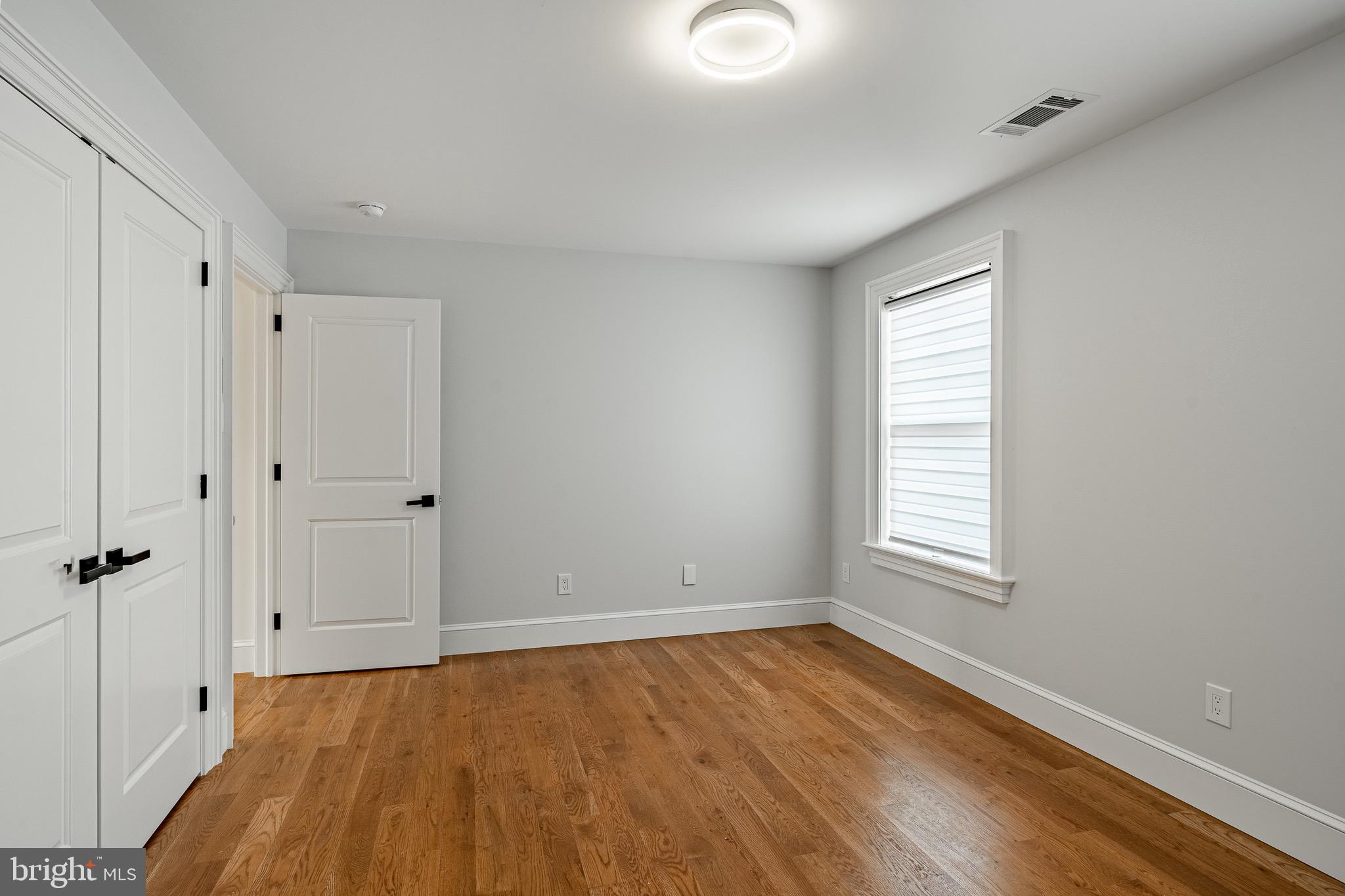 370 Boot Road West Chester, PA 19380 - Photo 33 of 56 a view of an empty room with wooden floor and a window