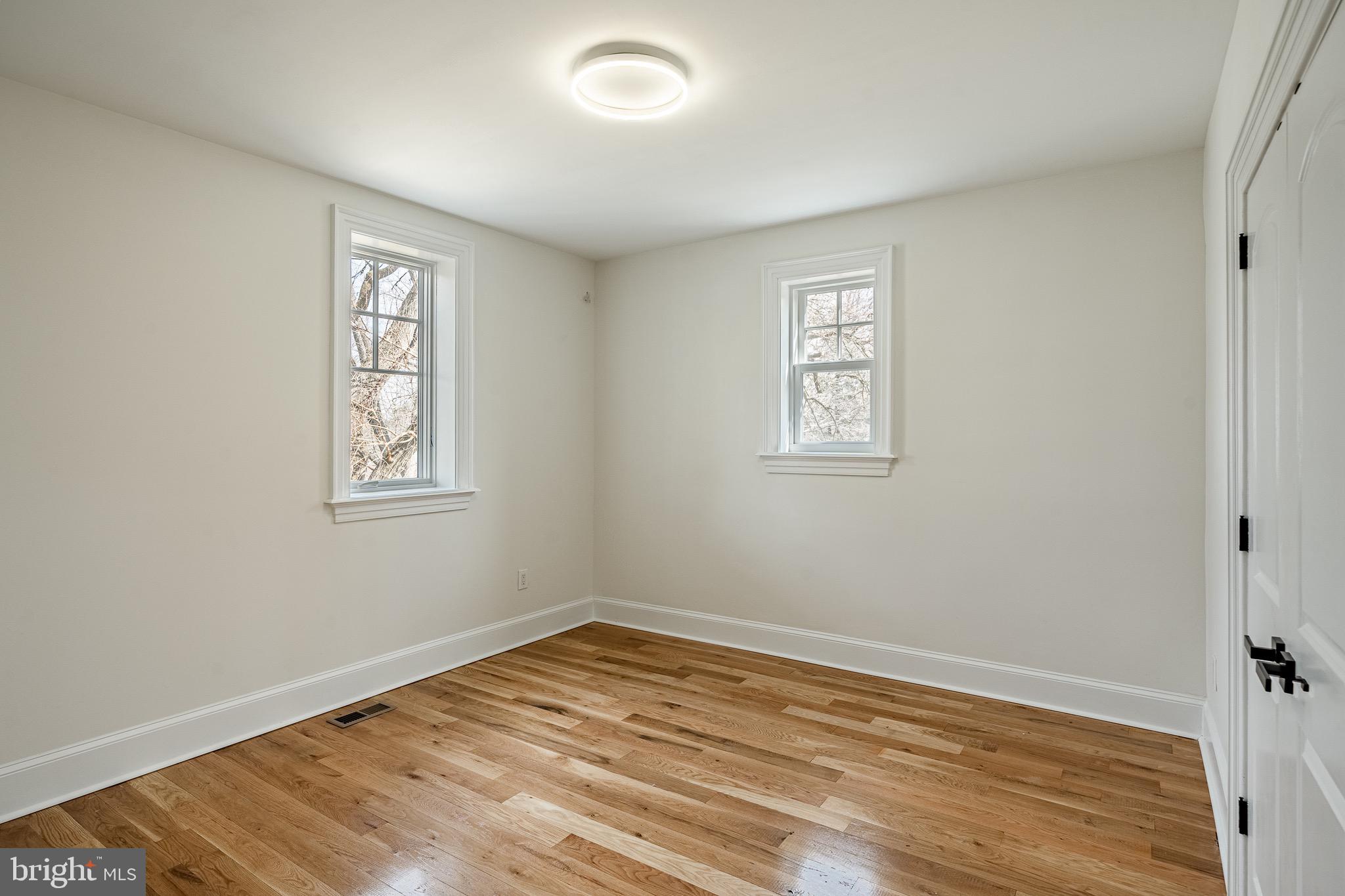 370 Boot Road West Chester, PA 19380 - Photo 35 of 56 a view of empty room with wooden floor and fan