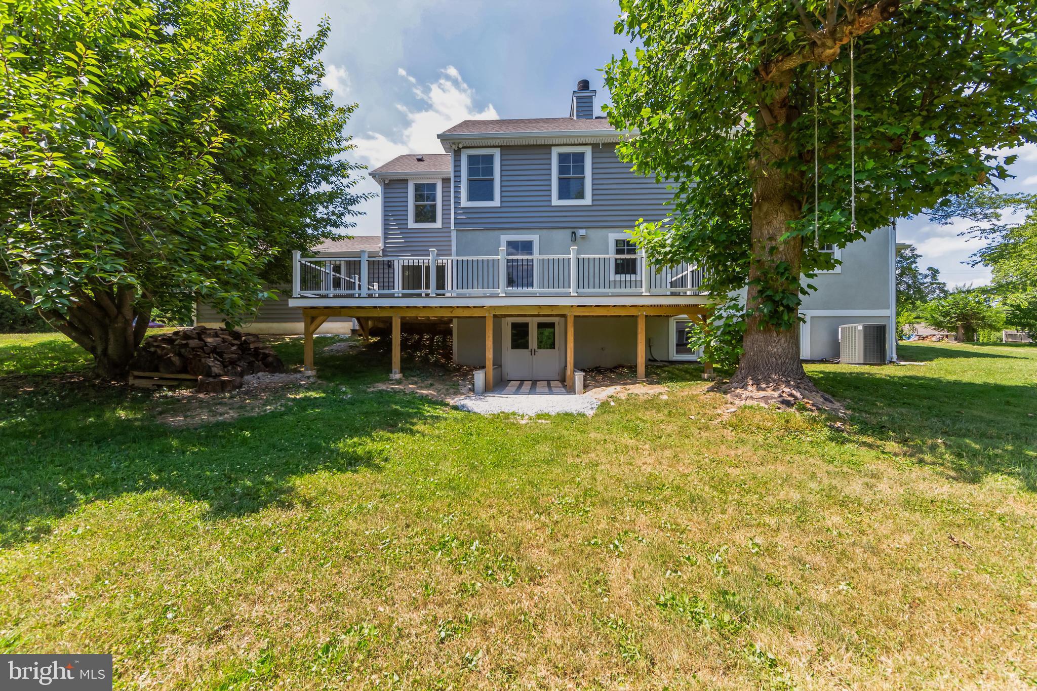 370 Boot Road West Chester, PA 19380 - Photo 47 of 56 a front view of a house with a yard