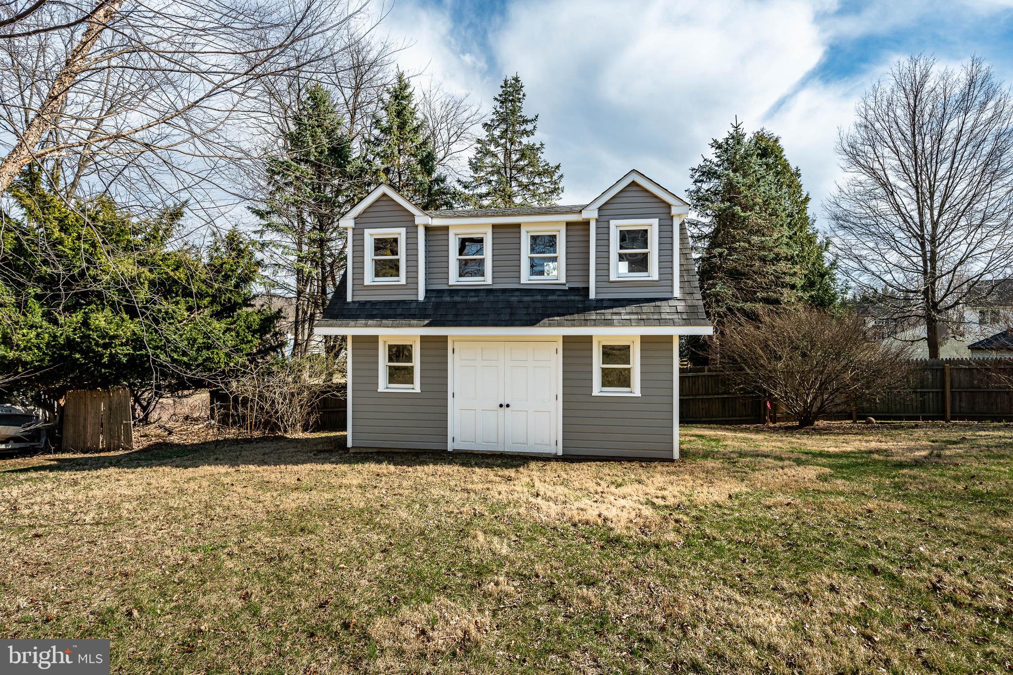 370 Boot Road West Chester, PA 19380 - Photo 50 of 56 a front view of a house with a garden