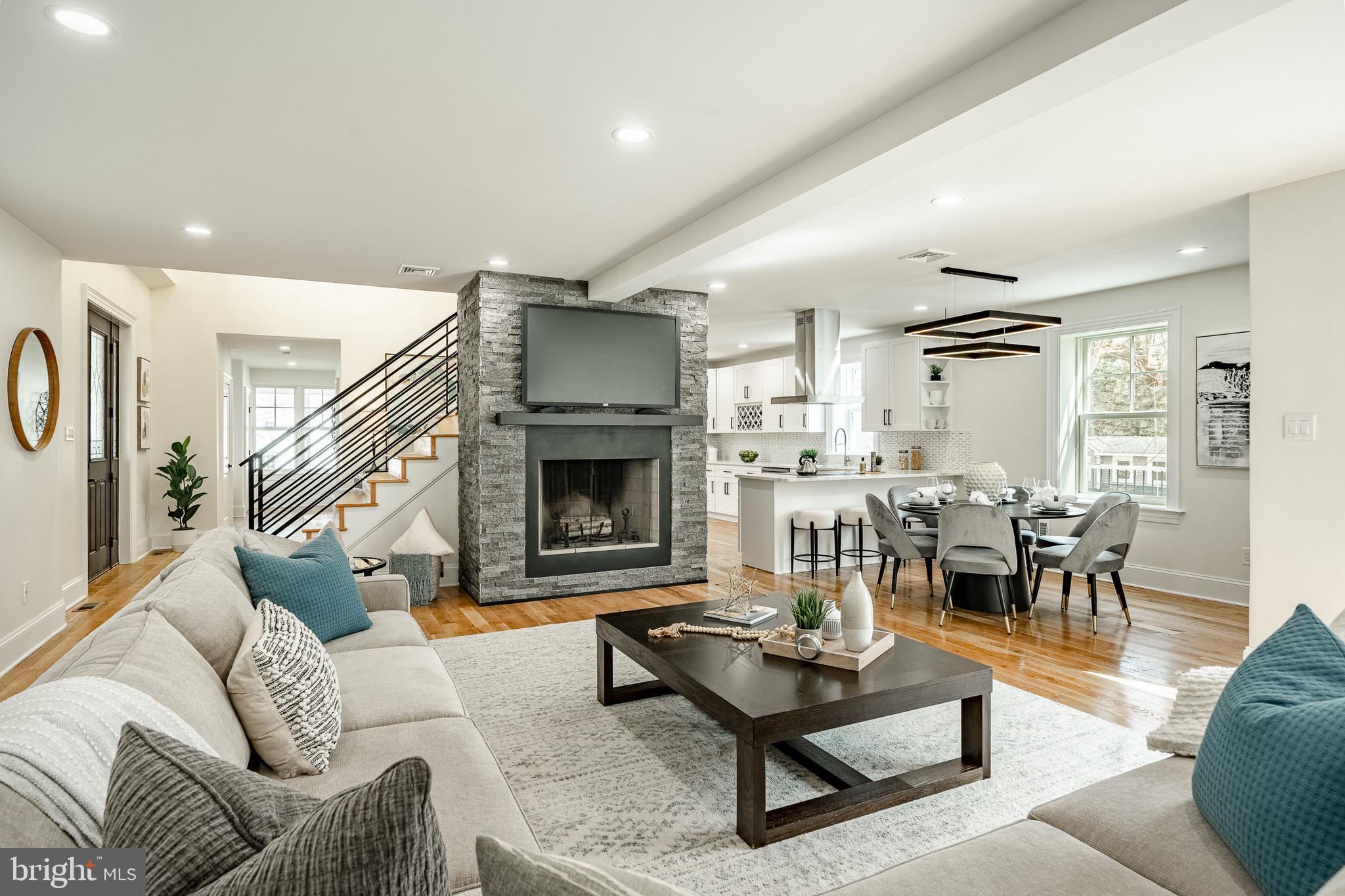370 Boot Road West Chester, PA 19380 - Photo 5 of 56 a living room with furniture and a fireplace