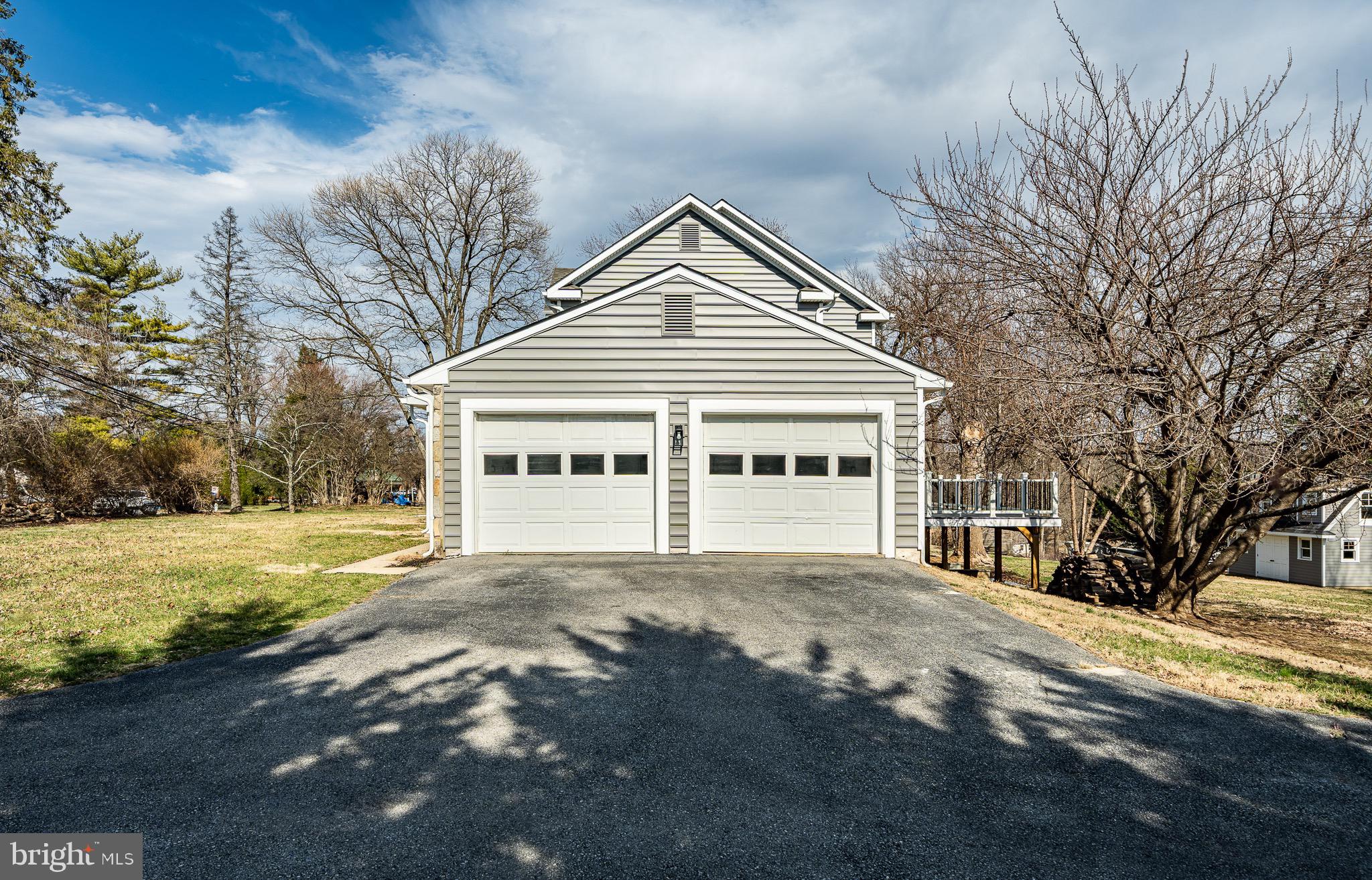 370 Boot Road West Chester, PA 19380 - Photo 52 of 56 a view of house with yard and trees in the background