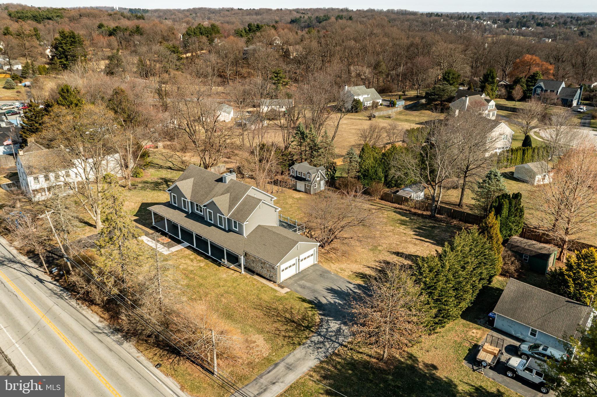 370 Boot Road West Chester, PA 19380 - Photo 56 of 56 an aerial view of a house with a yard and lake view