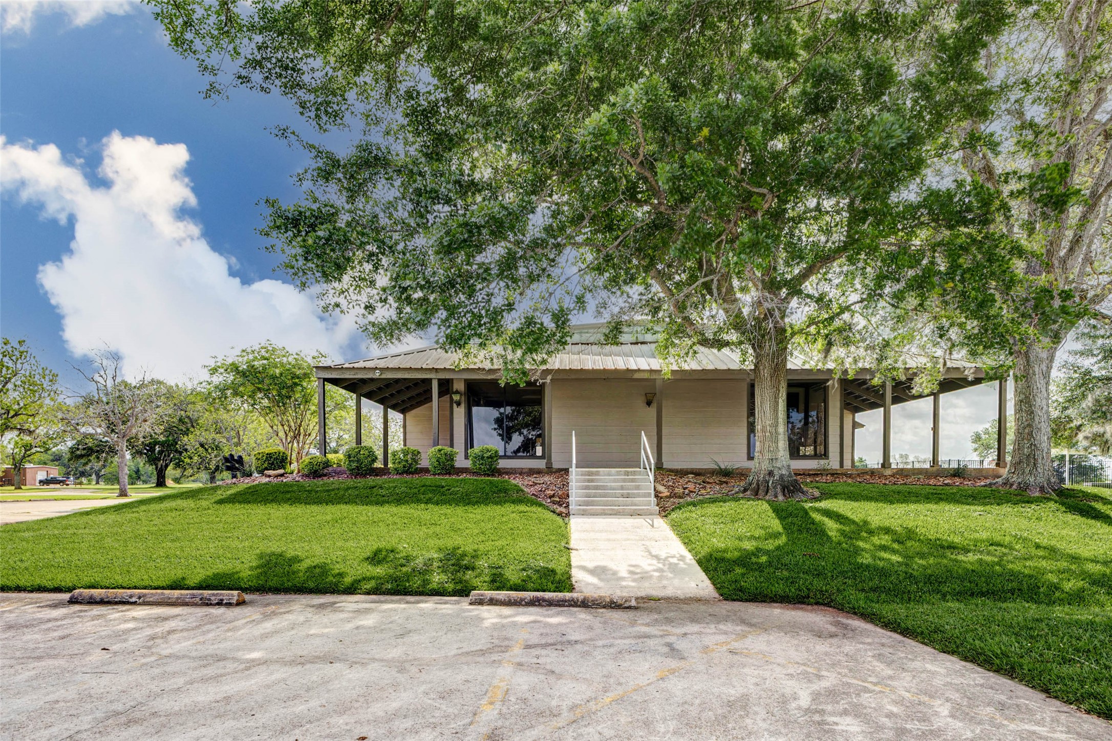 913 Buffalo Trail Angleton, TX 77515 - Photo 15 of 17 a front view of a house with a yard
