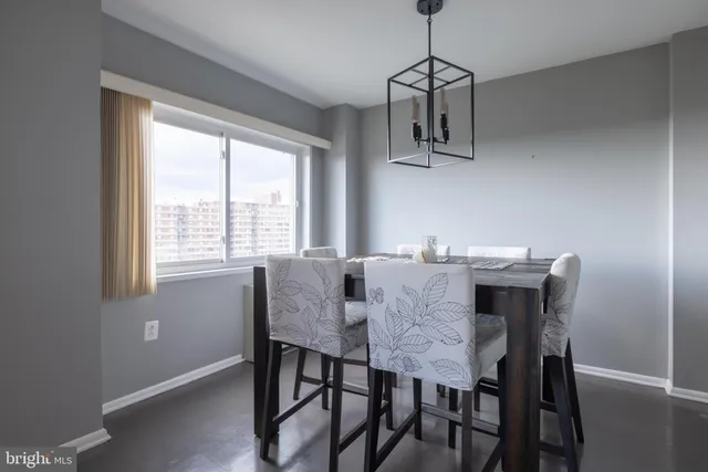 a view of a dining room with furniture