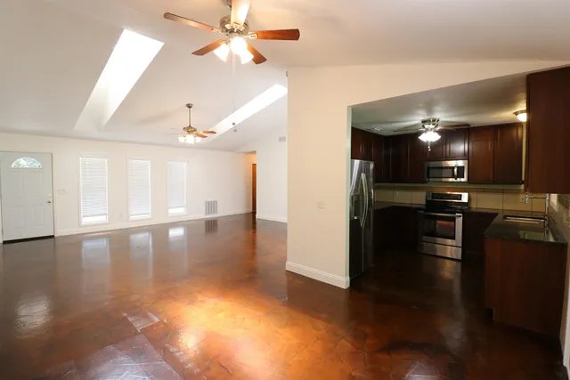 a view of a projector room with a kitchen