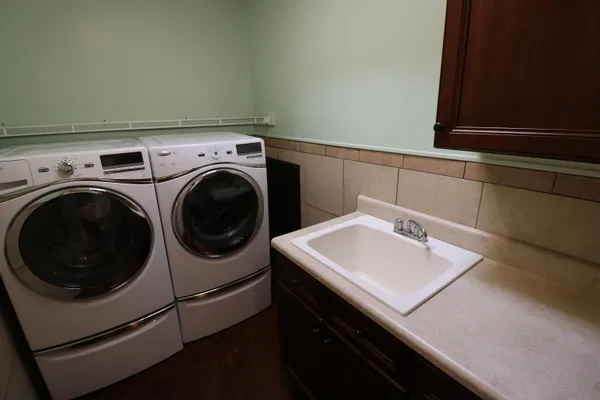 a utility room with dryer and washer