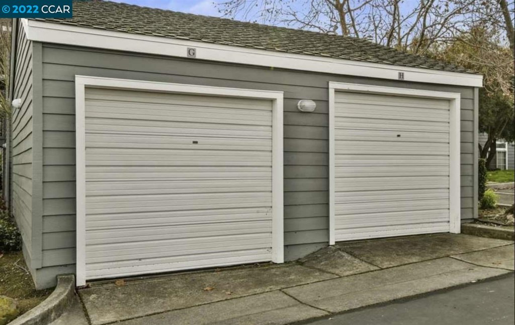 7650 Canyon Meadows Circle Pleasanton, CA 94588 - Photo 22 of 24 a view of a house with a garage
