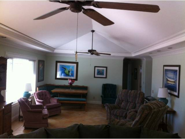 1931 Santa Ana Road Hollister, CA 95023 - Photo 11 of 13 a living room with furniture a ceiling fan and a window