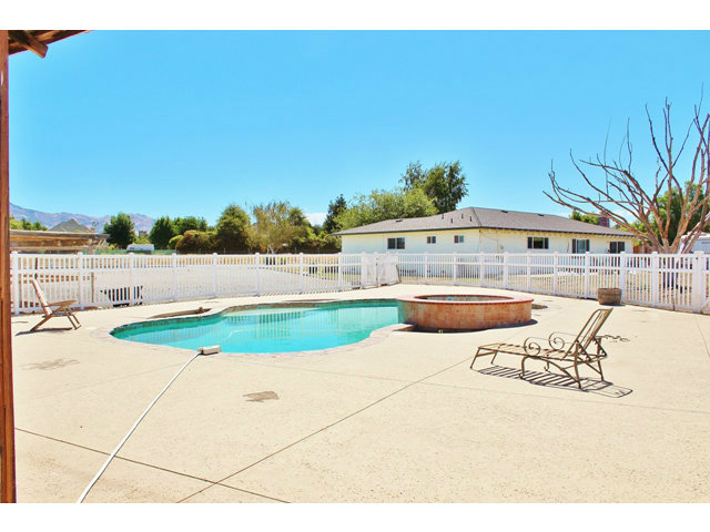 1931 Santa Ana Road Hollister, CA 95023 - Photo 5 of 13 a swimming pool with outdoor seating and yard