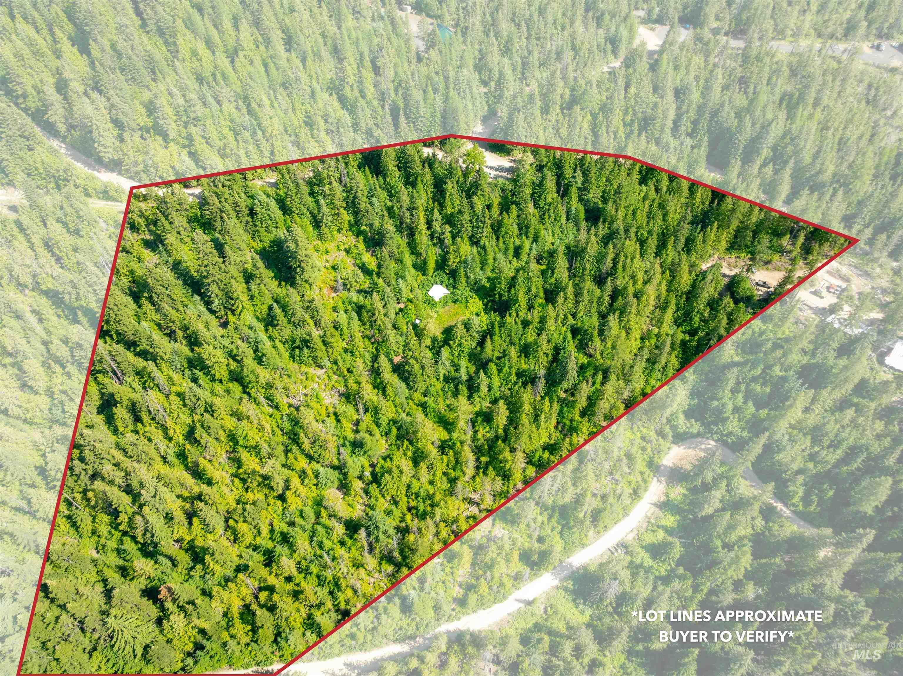 3176 Crystal Peak Road Fernwood, ID 83830 - Photo 11 of 14 Aerial overview of property's location with a forest and property boundaries highlighted