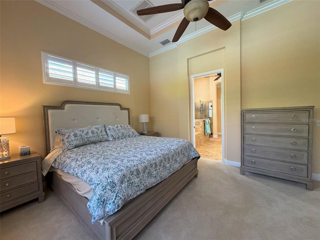 1024 West Beagle Run Loop Hernando, FL 34442 - Photo 28 of 44 a bedroom with a bed and a dresser