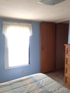 138 Woodland Church Road Clyde, NC 28721 - Photo 2 of 22 a view of a small space with a window