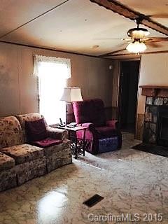 138 Woodland Church Road Clyde, NC 28721 - Photo 17 of 22 a living room with furniture and a window