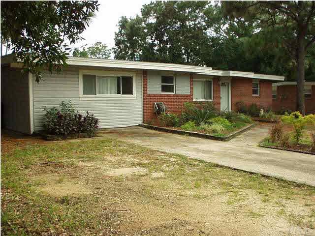 Garage has been enclosed to provide nice family room.