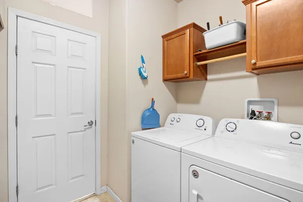 a utility room with dryer and washer