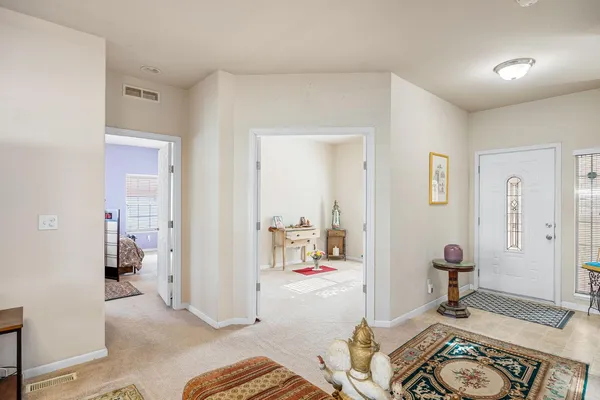 a view of livingroom with hardwood floor and a couch