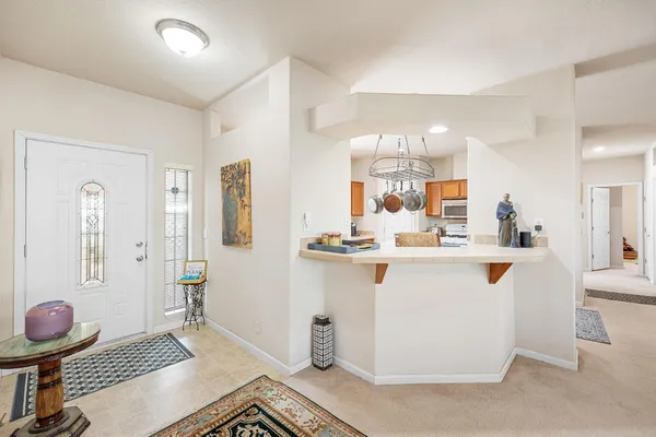 a view of kitchen and windows