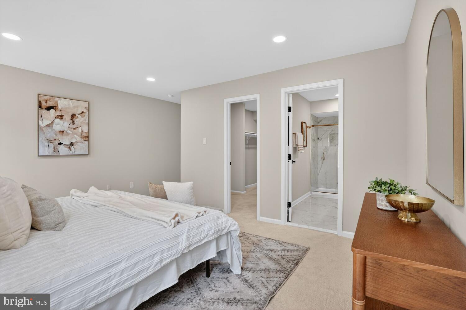 9217 Dorothy Lane Springfield, VA 22153 - Photo 31 of 58 a bedroom with a bed and hallway