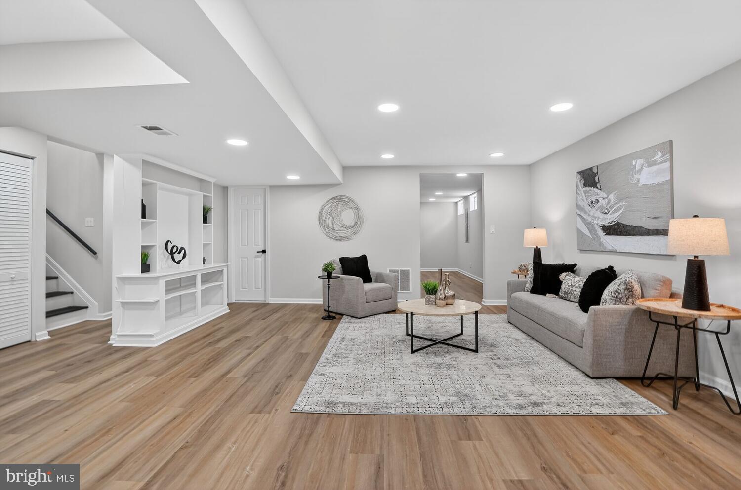 9217 Dorothy Lane Springfield, VA 22153 - Photo 38 of 58 a living room with fireplace furniture and a wooden floor