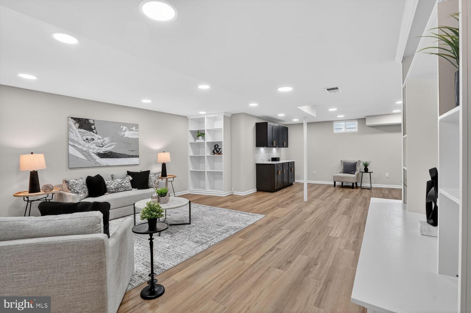 9217 Dorothy Lane Springfield, VA 22153 - Photo 42 of 58 a living room with furniture and a table