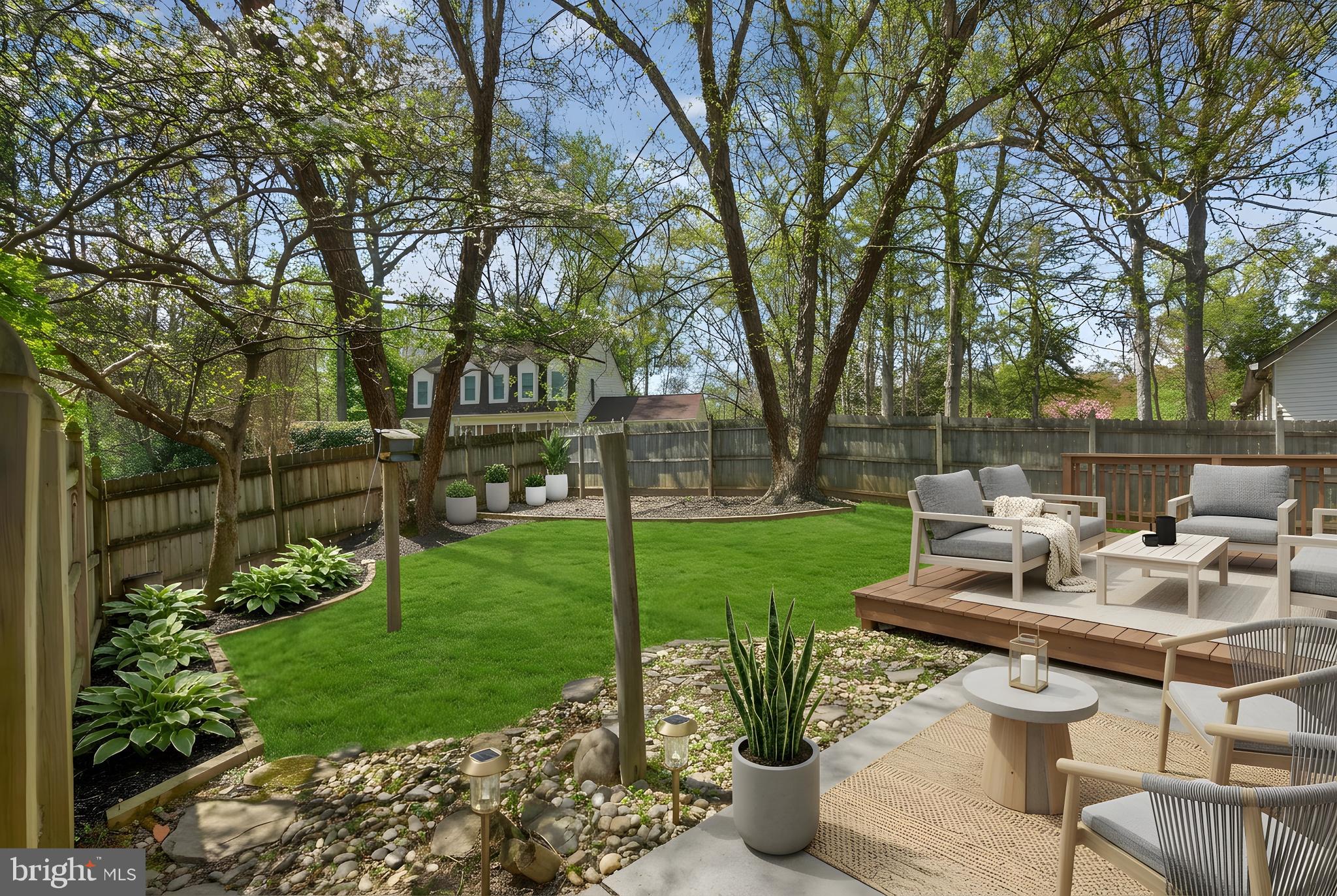 9217 Dorothy Lane Springfield, VA 22153 - Photo 47 of 58 a view of a backyard with sitting area and garden