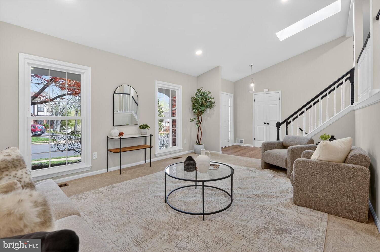 9217 Dorothy Lane Springfield, VA 22153 - Photo 6 of 58 a living room with furniture and a floor to ceiling window