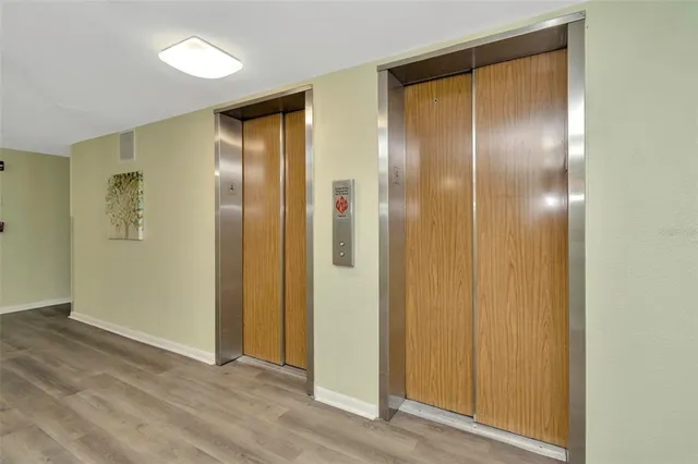 an aerial view of a house with a ocean view