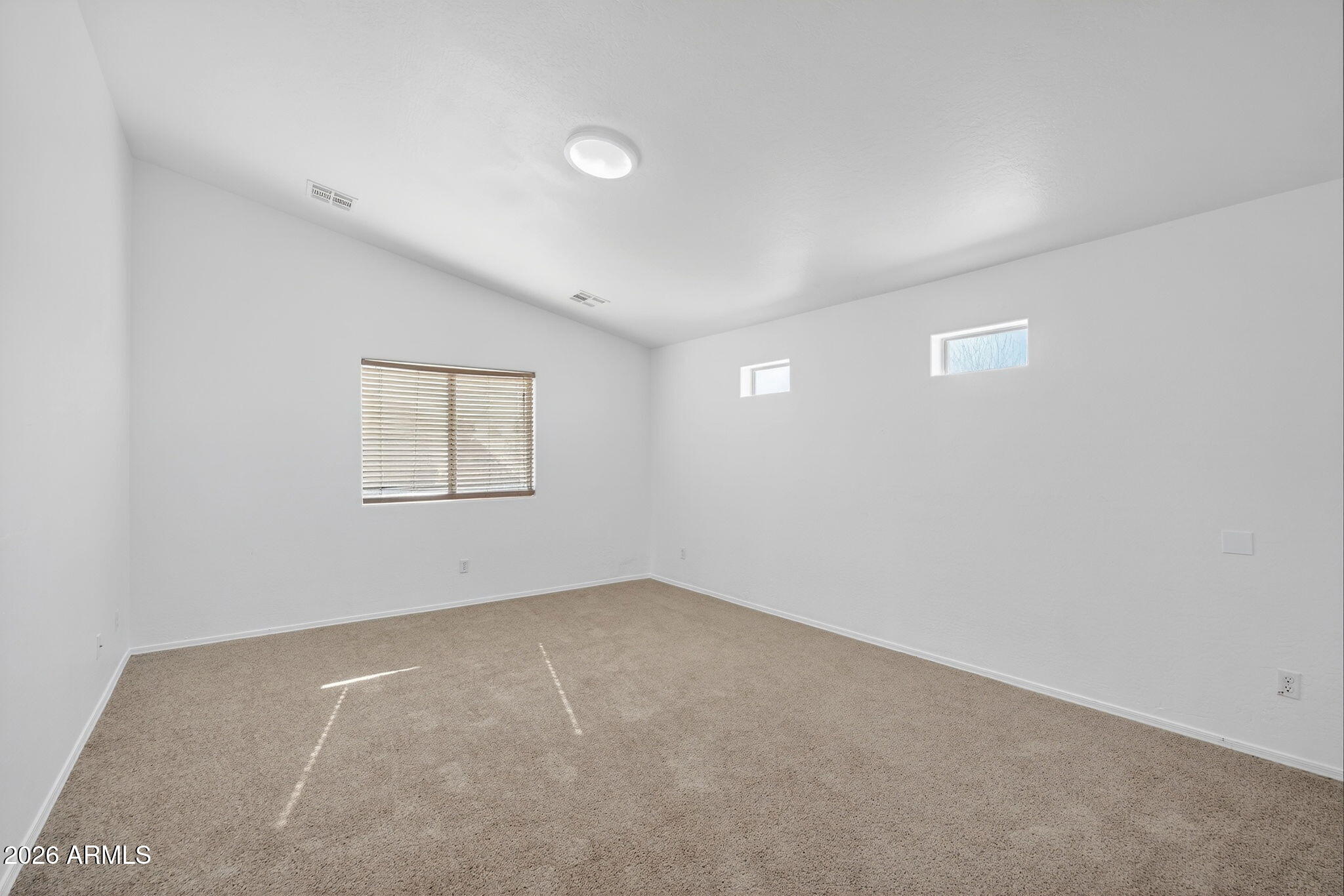 46039 West Amsterdam Road Maricopa, AZ 85139 - Photo 27 of 61 an empty room with a window