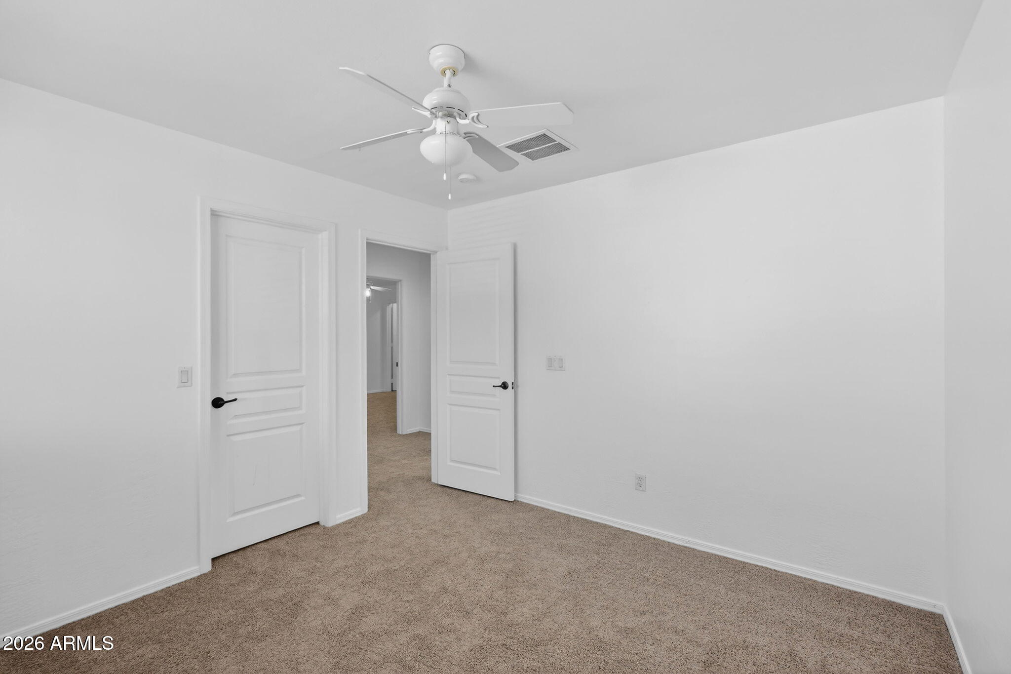 46039 West Amsterdam Road Maricopa, AZ 85139 - Photo 32 of 61 an empty room with a bathroom