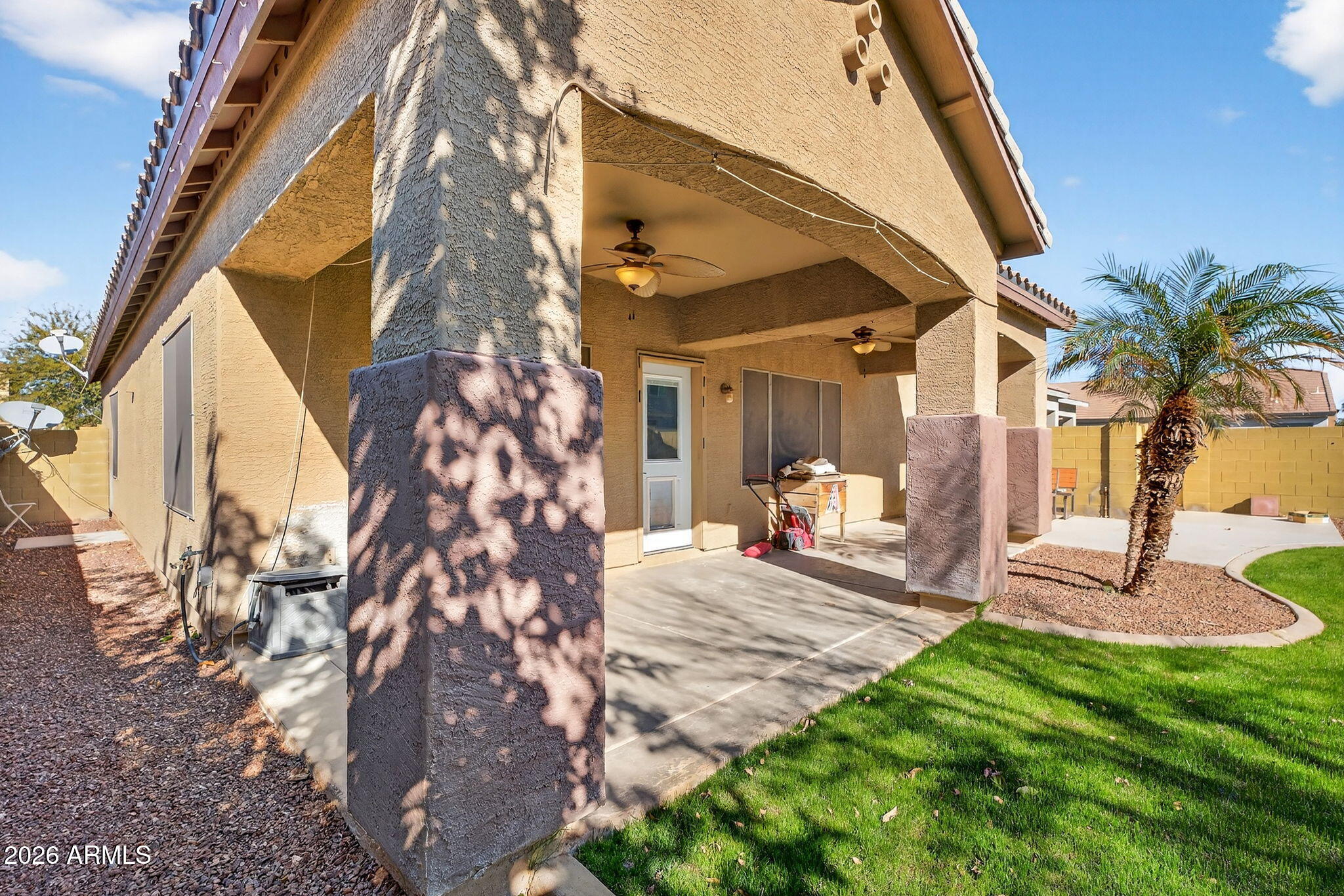 46039 West Amsterdam Road Maricopa, AZ 85139 - Photo 51 of 61 a front view of a house with garden