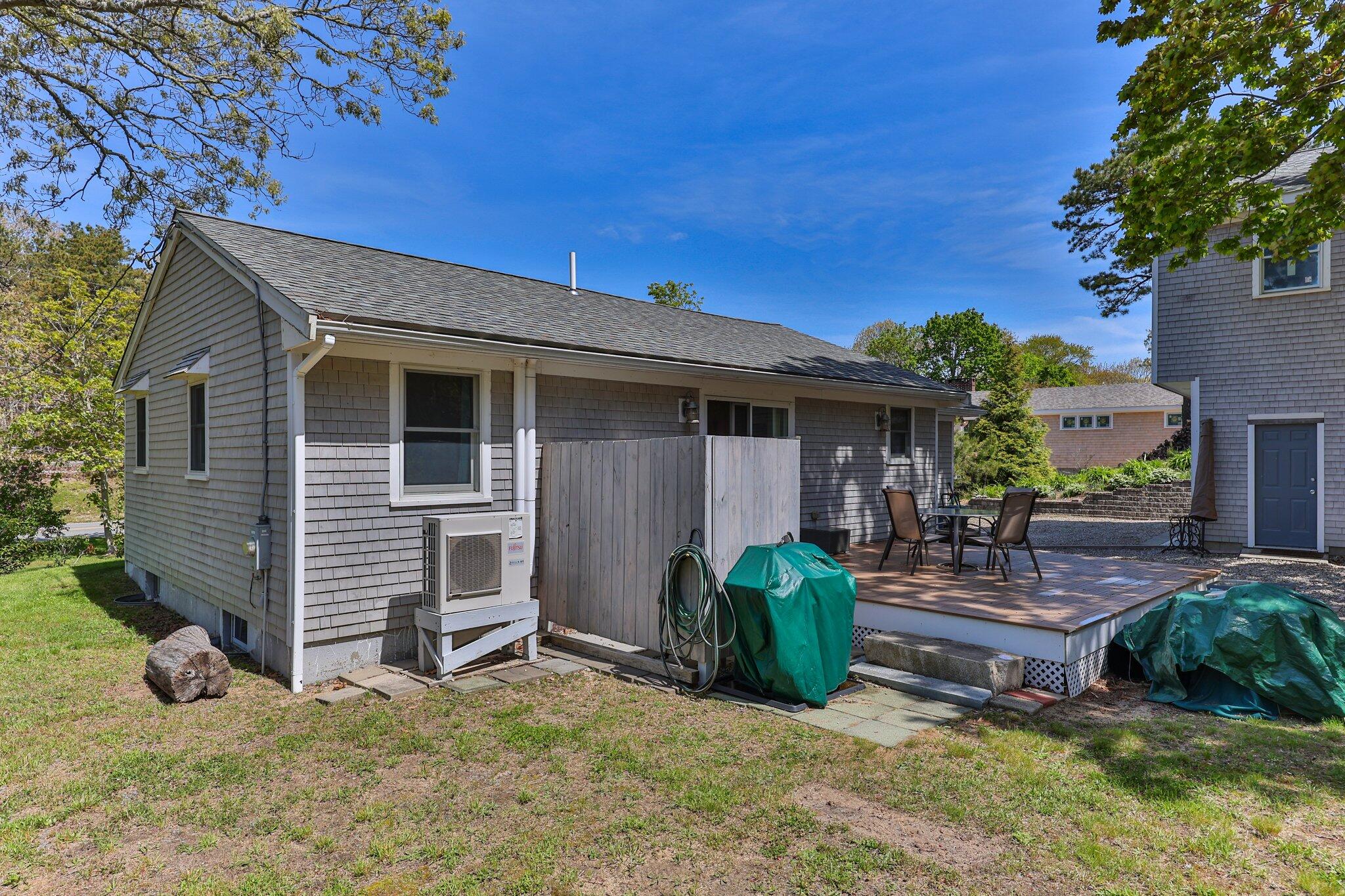 19 South Highland Road Truro, MA 02666 - Photo 29 of 45 a view of a house with a yard and sitting area