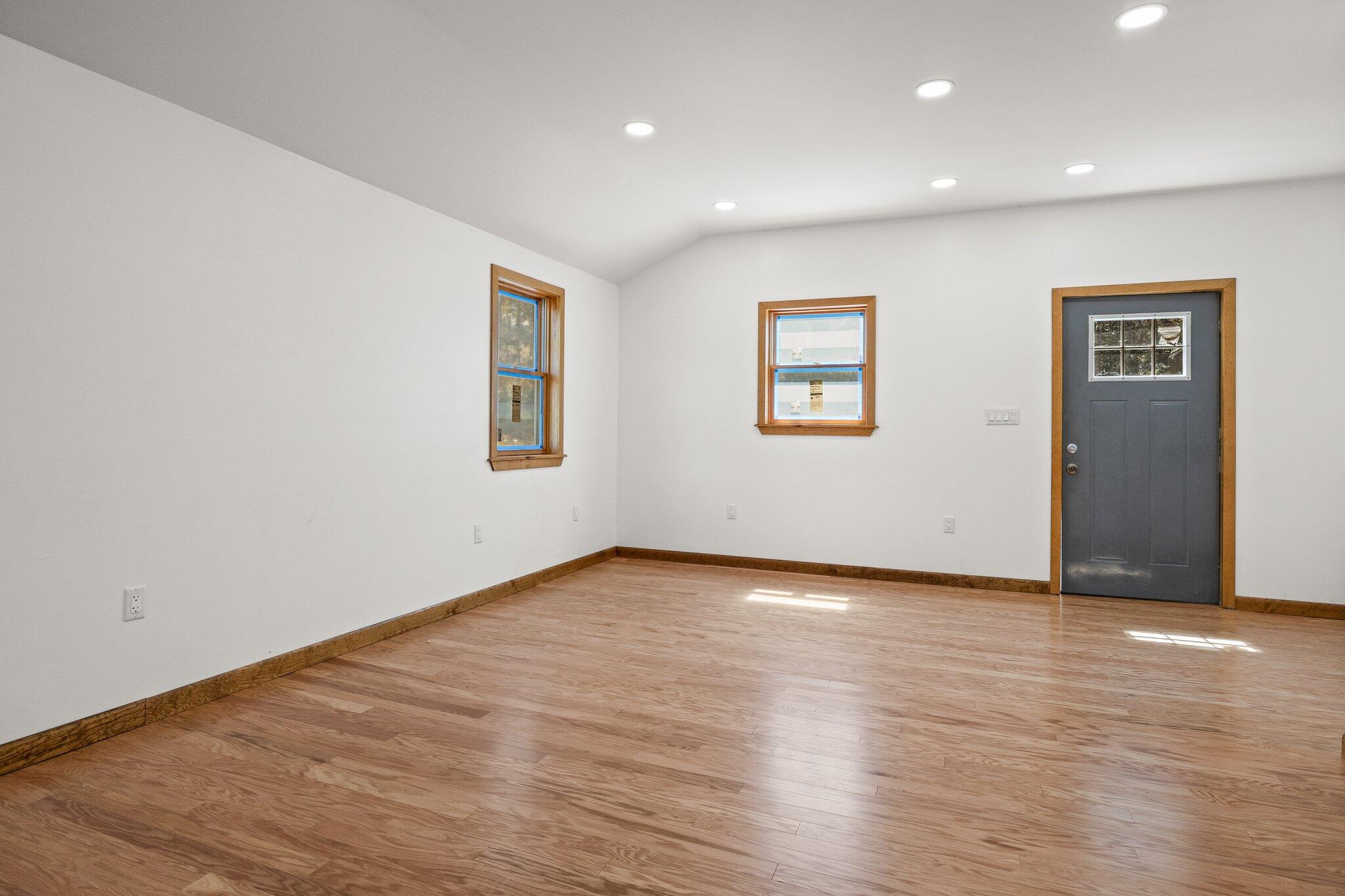 19 South Highland Road Truro, MA 02666 - Photo 36 of 45 a view of an empty room with wooden floor and a window