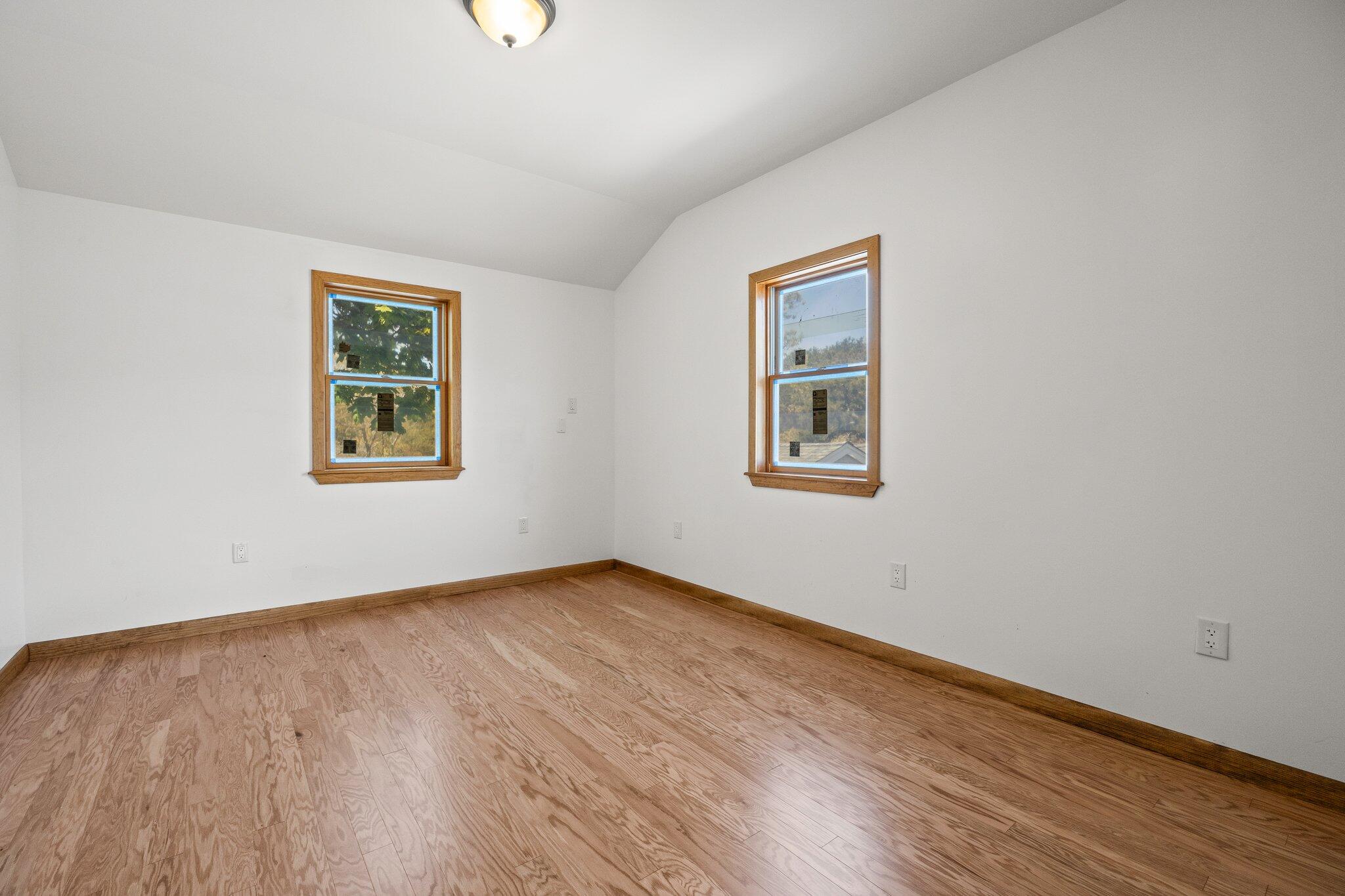 19 South Highland Road Truro, MA 02666 - Photo 38 of 45 a view of an empty room with wooden floor and a window