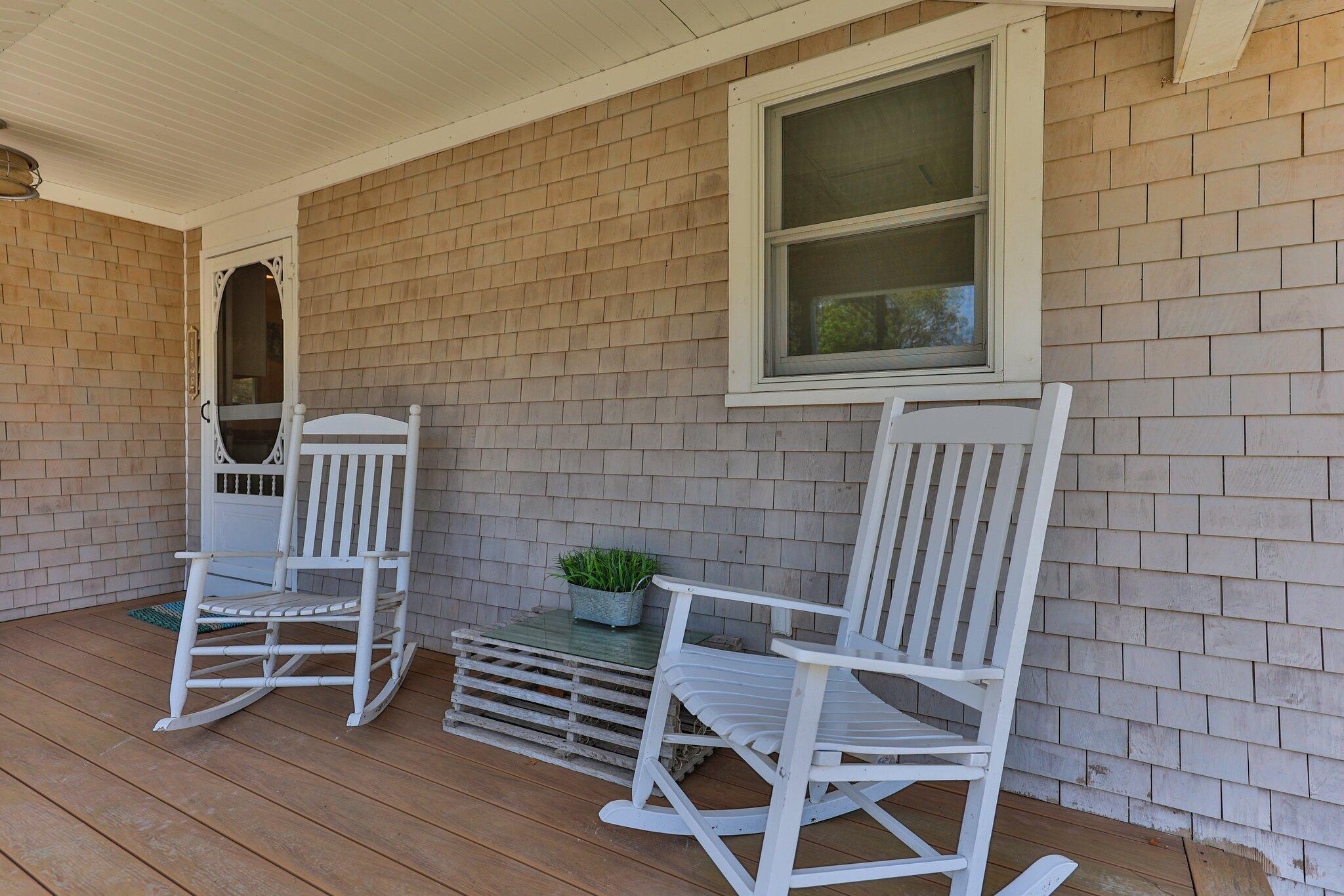 19 South Highland Road Truro, MA 02666 - Photo 4 of 45 a view of a chair and table in the patio
