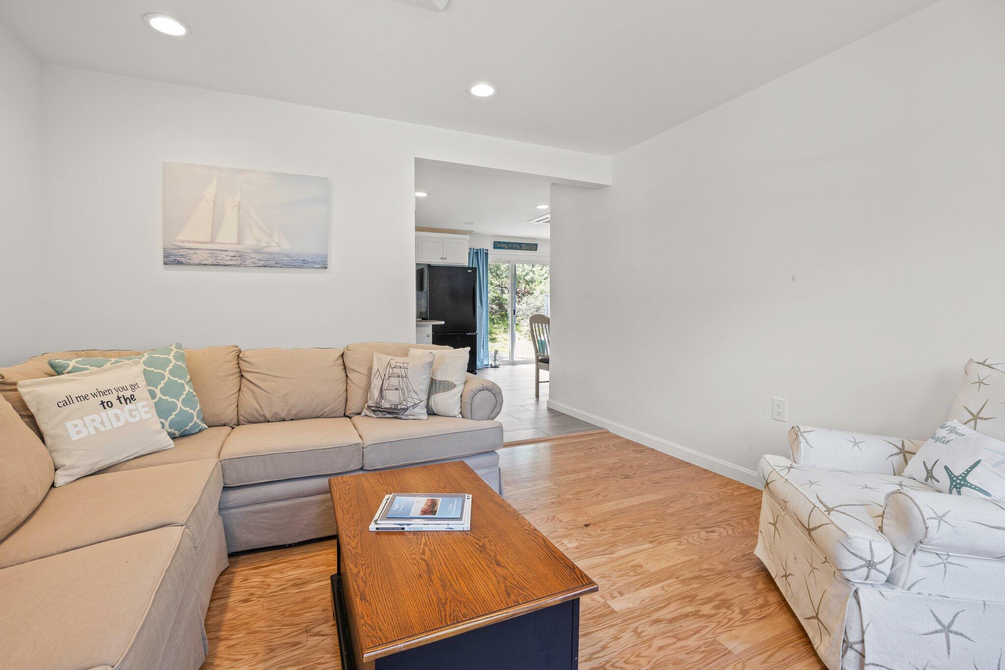 19 South Highland Road Truro, MA 02666 - Photo 7 of 45 a living room with furniture and a couch