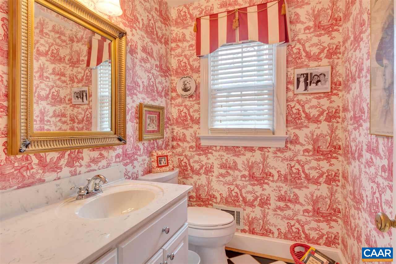1442 Grove Road Charlottesville, VA 22901 - Photo 11 of 31 a bathroom with a sink a toilet and a bathtub
