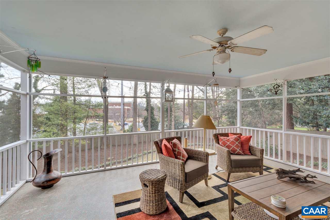1442 Grove Road Charlottesville, VA 22901 - Photo 12 of 31 a living room with furniture and a floor to ceiling window