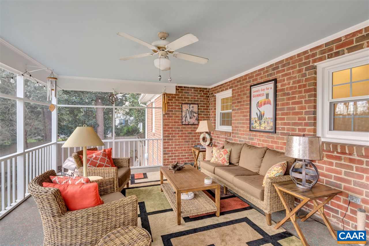 1442 Grove Road Charlottesville, VA 22901 - Photo 13 of 31 a living room with furniture and a floor to ceiling window