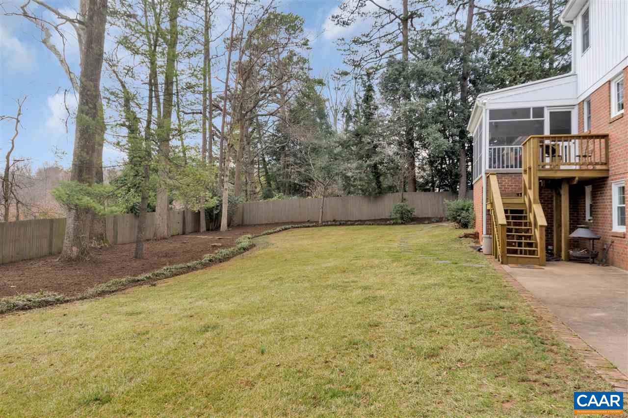 1442 Grove Road Charlottesville, VA 22901 - Photo 14 of 31 a view of a yard with brick wall