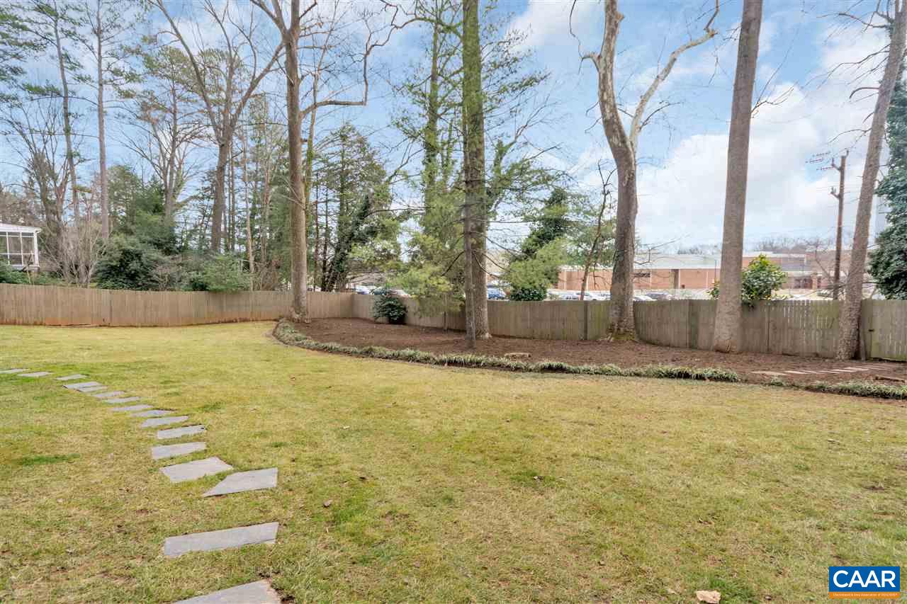 1442 Grove Road Charlottesville, VA 22901 - Photo 15 of 31 a view of a swimming pool with a yard and large trees