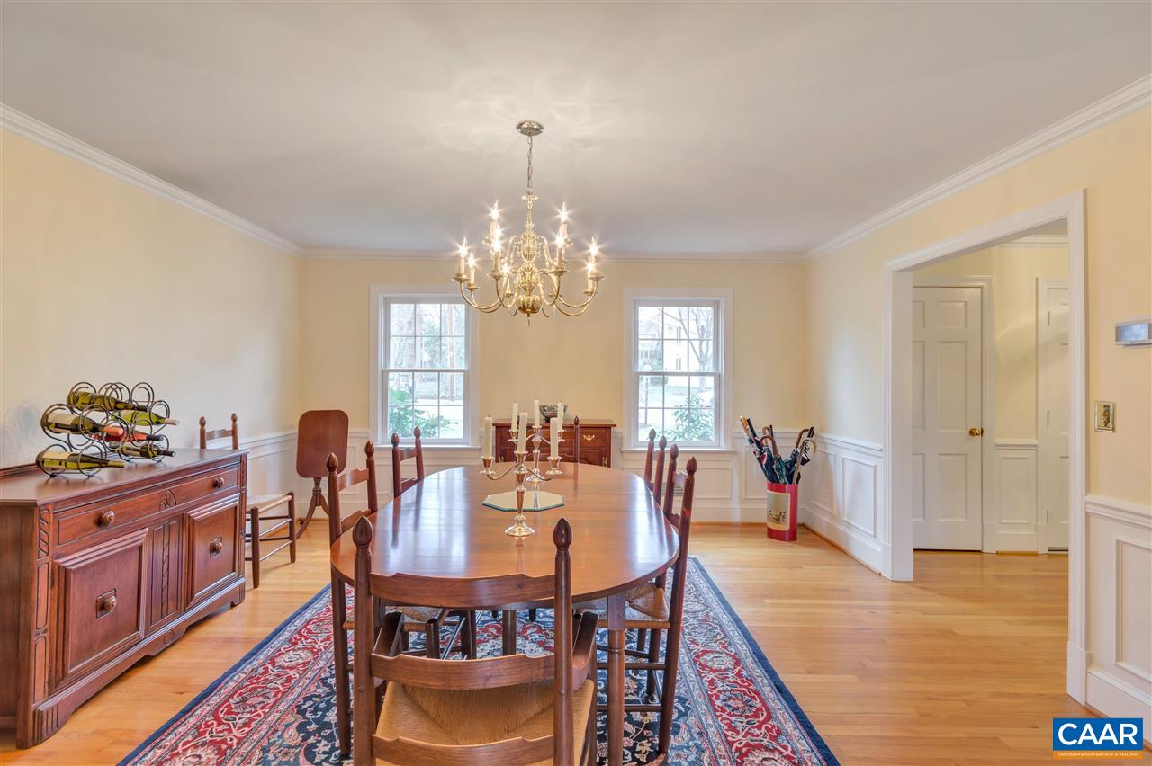 1442 Grove Road Charlottesville, VA 22901 - Photo 9 of 31 a view of a dining room with furniture and chandelier