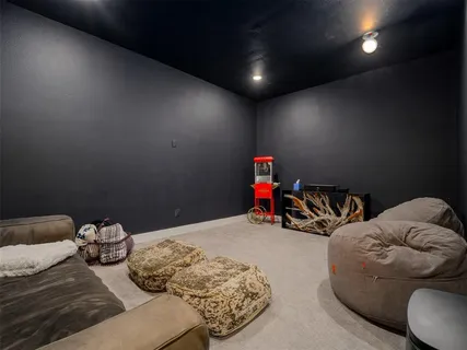 a bedroom with bed and a wooden floor