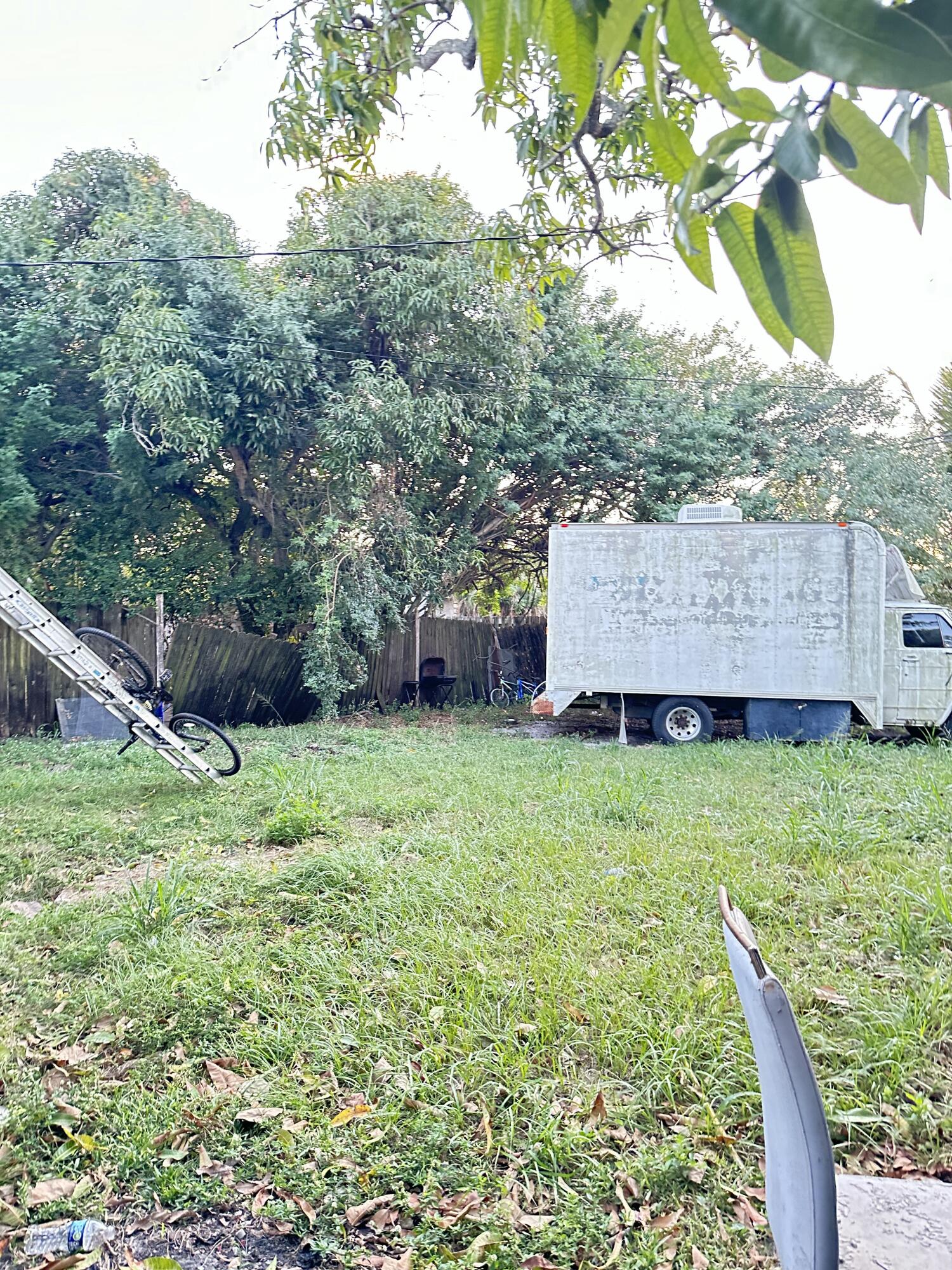116 Southwest 11th Avenue Delray Beach, FL 33444 - Photo 5 of 10 a view of a backyard with a garden